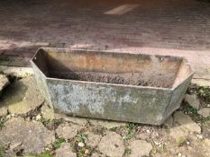 A CAST IRON CANTED TROUGH W 120 D 41 H 38. VIEWING FOR THIS ITEM IS BY APPOINTMENT ONLY, AND IS