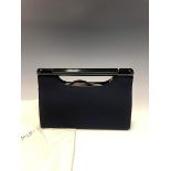 A STUART WEITZMAN FOR RUSSELL & BROMLEY NAVY EVENING BAG COMPLETE WITH SHOULDER STRAP AND DUST
