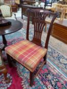 A GEORGE III MAHOGANY ELBOW CHAIR WITH PIERCED FOUR HORIZONTAL BAR BACK, THE UPHOLSTERED SEAT ON
