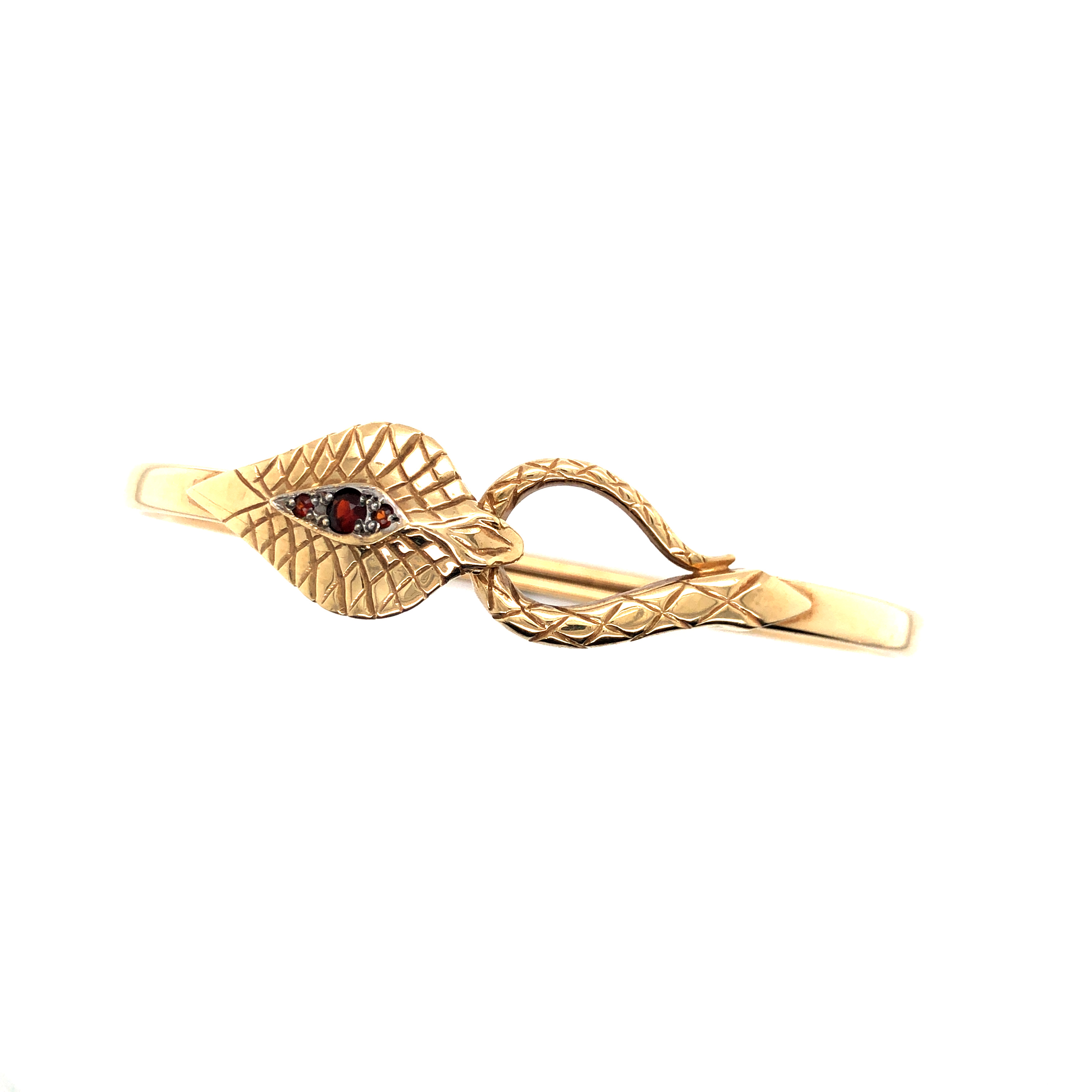 A 9ct HALLMARKED GOLD AND GARNET SET COBRA SNAKE FORM BANGLE. WEIGHT 9.86grms. - Image 4 of 4