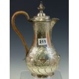 A SILVER COFFEE POT BY WEST AND SON, DUBLIN 1898, THE BASE OF THE BALUSTER SHAPE WORKED WITH STAG