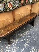 A LATE 19th/ EARLY 20th C. PINE BENCH, THE NARROW ENDS ROUNDED ABOVE THE PLANK LEGS. W 135 x D 22