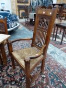 AN UNUSUAL SET OF SEVEN ANTIQUE CARVED OAK GOTHIC REVIVAL DINING CHAIRS WITH RUSH SEATS, INCLUDES