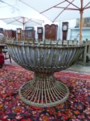 A LARGE GALVANIZED BOWL SHAPED FIRE PIT ON INTERESTING WROUGHT IRON BASE