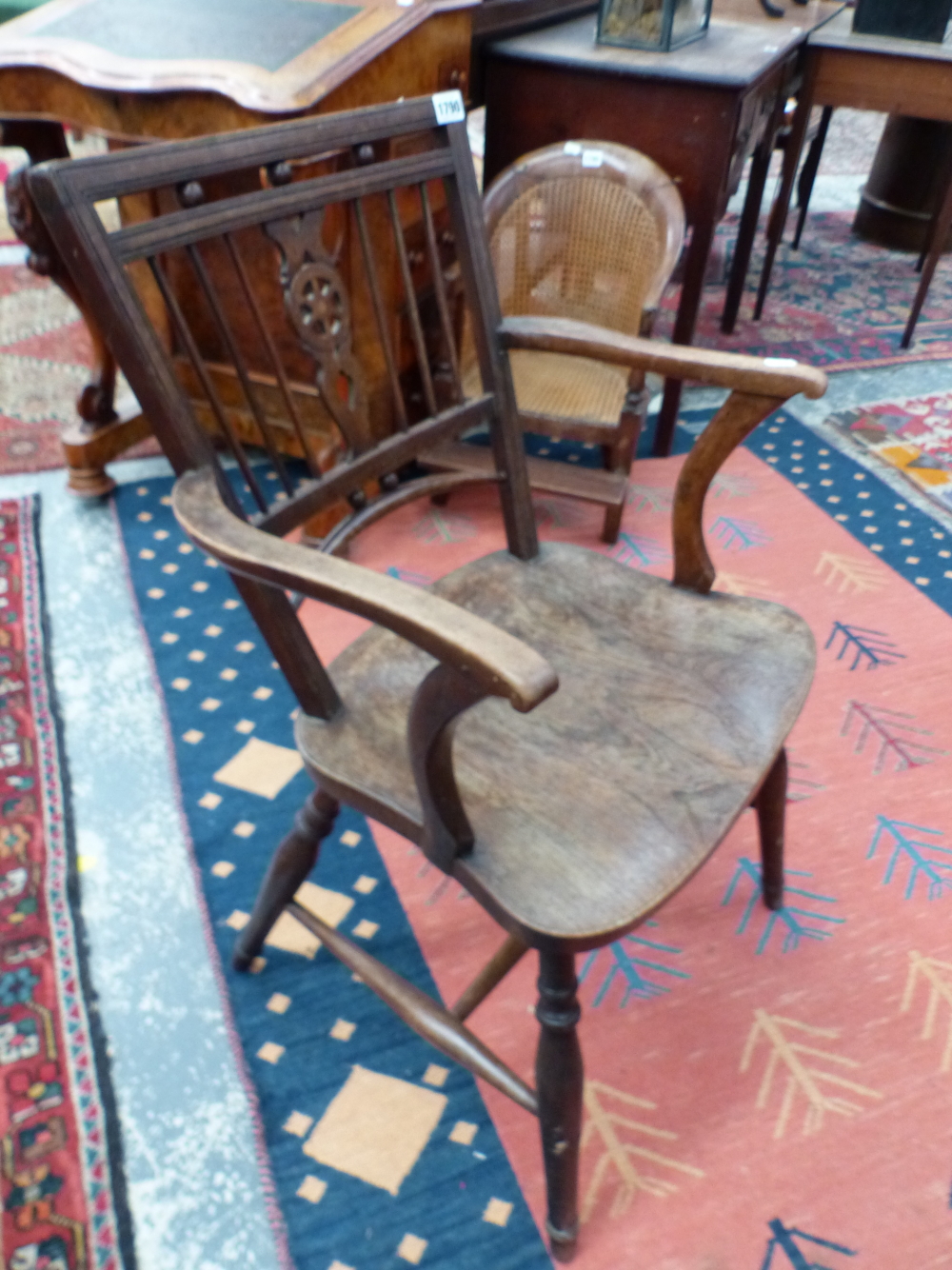 A 19th C. LINE INLAID ELBOW CHAIR THE WHEEL SPLAT FLANKED BY THREE BARS ABOVE AN OAK SADDLE SEAT - Image 4 of 6
