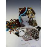 A LARGE COLLECTION OF VARIOUS VINTAGE TRIBAL NORTH AFRICAN AND MIDDLE EASTERN LOOSE BEADS AND