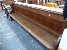 A LATE VICTORIAN OAK PEW. W 295 x D 49 x H 97cms.