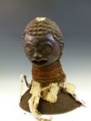 A 19th C. YORUBA DANCE OF THE HUNTER HEADDRESS, THE HEAD WITH TINTED COLOURS TO THE FACE, BARK
