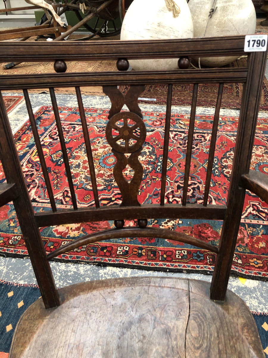 A 19th C. LINE INLAID ELBOW CHAIR THE WHEEL SPLAT FLANKED BY THREE BARS ABOVE AN OAK SADDLE SEAT - Image 2 of 6