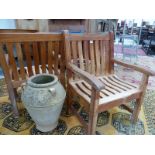 A PAIR OF TEAK GARDEN ARMCHAIRS BY WESTMINSTER.