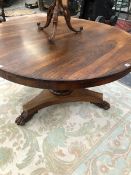 A WILLIAM IV ROSEWOOD BREAKFAST TABLE, THE CIRCULAR TOP ON AN OCTAGONAL COLUMN FLARING TO A