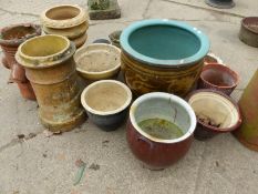 A LARGE ORIENTAL STYLE GLAZED PLANTER TOGETHER WITH VARIOUS OTHERS