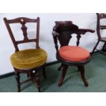 TWO CARVED VICTORIAN REVOLVING CHAIRS, AN ADJUSTABLE MUSIC CHAIR AND A DESK ARMCHAIR