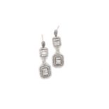 A PAIR OF MULTI DIAMOND ARTICULATING DROP EARRINGS. THE STEMS STAMPED 18ct AND ASSESSED AS 18ct