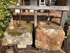 A CIDER PRESS COMPRISING OF TWO BLOCKS, WITH WROUGHT IRON MOUNTS 64 X 66 AND 51 X 73 cms. VIEWING