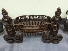 A VINTAGE WROUGHT IRON FIRE FENDER W104CM TOGETHER WITH AN UNUSUAL GRATE AND A PAIR OF SIMILAR