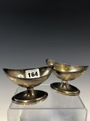 A PAIR OF GEORGE III SILVER NAVETTE SHAPED SALTS BY THOMAS WATSON, NEWCASTLE, EACH GILDED WITHIN THE