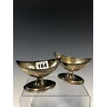 A PAIR OF GEORGE III SILVER NAVETTE SHAPED SALTS BY THOMAS WATSON, NEWCASTLE, EACH GILDED WITHIN THE