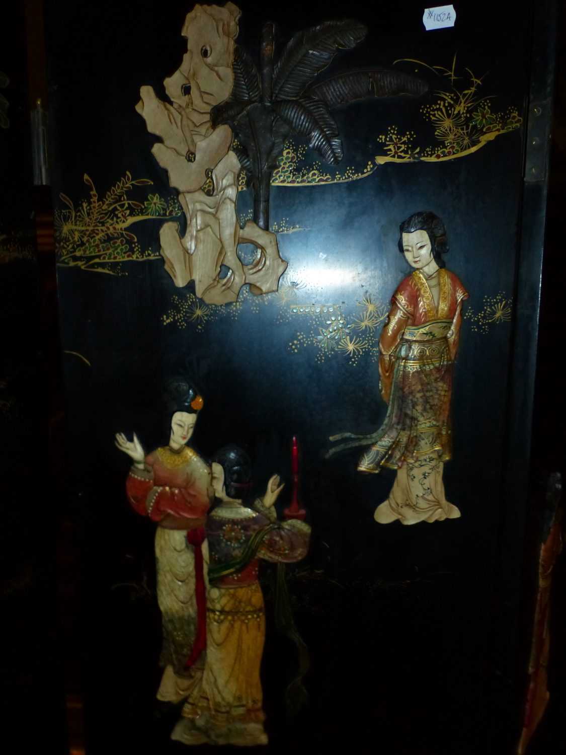A CHINESE LACQUER AND INLAID SIX FOLD FLOOR SCREEN, DECORATED WITH FIGURES IN RELIEF IN TERRACES AND - Image 5 of 21