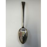 A GEORGE III SILVER OLD ENGLISH PATTERN BASTING SPOON BY THOMAS PEACOCK, LONDON 1814, BEARING