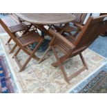 A SET OF SIX TEAK FOLDING GARDEN CHAIRS (6)