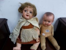 AN ARMAND MARSEILLE DOLL WITH COMPOSITION HEAD TOGETHER WITH ANOTHER DOLL, POSSIBLY BY HEUBACH