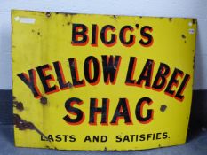 A VINTAGE YELLOW GROUND ENAMEL SIGN INSCRIBED IN RED AND BLACK BIGGS YELLOW LABEL SHAG. 103 x