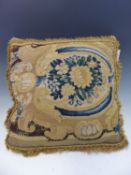 A CUSHION SEWN WITH 18th C. TAPESTRY WORK ON ONE SIDE TOGETHER WITH TWO OTHER DAMASK CUSHIONS