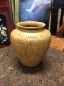 AN ANTIQUE UNUSUAL SMALL POTTERY VESSEL WITH SCRATCH INCISED DECORATION