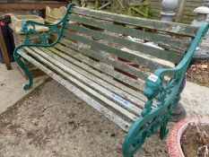 A GARDEN BENCH WITH PAINTED IRON ENDS. H 78 x W 131 x D 59cms