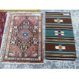 A PERSIAN HAMADAM RUG TOGETHER WITH A FLAT WEAVE RUG120 x 64 cms