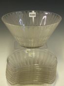 NINE LALIQUE JAFFA PATTERN CRESCENT SHAPED SALAD PLATES TOGETHER WITH A BOWL. Dia. 25.5cms.