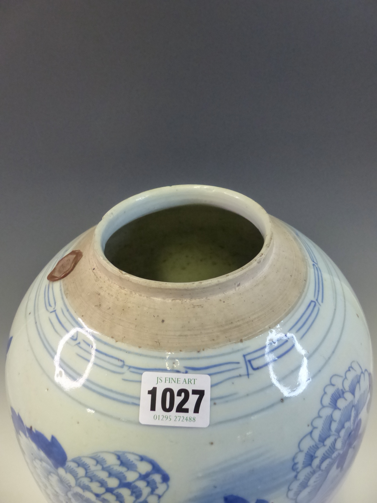 A CHINESE BLUE AND WHITE JAR PAINTED WITH PEONIES GROWING AMONGST ROCKS. Dia. 23cms. - Image 2 of 5