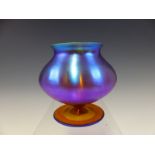 ATTRIBUTED TO WMF, A MAUVE IRIDESCENT GOBLET SHAPED GLASS VASE. H 10cms.