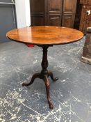 A GEORGE III MAHOGANY BIRD CAGE TRIPOD TABLE, THE TILTING TOP ON A BALUSTER COLUMN AND LONG NOSE