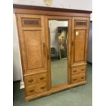 A LATE VICTORIAN ASH AND BURL PANELLED TRIPLE WARDROBE, CENTRAL MIRROR DOOR, FOUR DRAWERS. H 213 x W