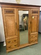 A LATE VICTORIAN ASH AND BURL PANELLED TRIPLE WARDROBE, CENTRAL MIRROR DOOR, FOUR DRAWERS. H 213 x W