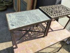 A MARBLE TOP TABLE ON WROUGHT IRON BASE, TOGETHER WITH A SIMILAR SMALLER EXAMPLE AND A IRON FOOTMAN