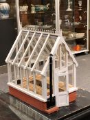 A GOOD MINIATURE DOLLS HOUSE SIZE "COUNTRY HOUSE" GREENHOUSE