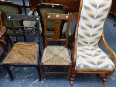 A VICTORIAN BEECH ROCKING CHAIR TOGETHER WITH AN ARTS AND CRAFTS OAK RUSH SEATED CHAIR AND A