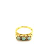 AN 18ct HALLMARKED GOLD THREE STONE GRADUATED OPAL AND DIAMOND CARVED HALF HOOP RING, DATED 1989,
