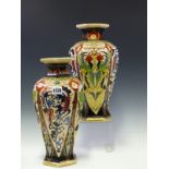 A PAIR OF NORITAKE HEXAGONAL VASES PAINTED WITH ALTERNATING LAPPET PANELS OF DRAGONS AND PHOENIX.