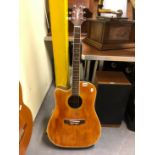 TAKAMINE LEFT-HANDLED ACOUSTIC GUITAR WITH CUTAWAY AND INTERNAL ELECTRICS, WITH ORIGINAL HARD CASE