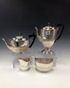 A MATCHED SILVER FOUR PIECE TEA AND COFFEE SET, THE TEA POT, TWO HANDLED SUGAR AND MILK JUG BY