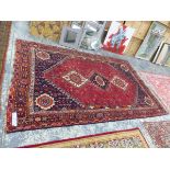 A PERSIAN SHIRAZ CARPET 310 x 193 cm