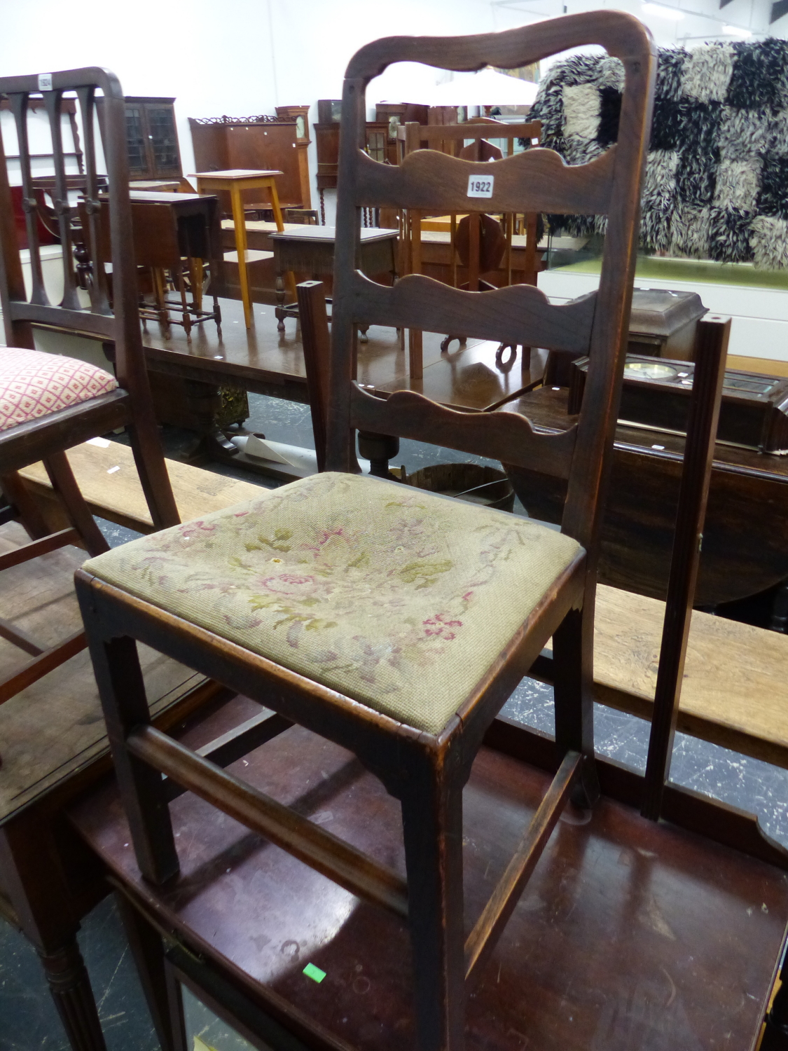 AN 18th C. OAK LADDER BACK CHAIR WITH DROP IN SEAT AND ON SQUARE SECTIONED LEGS. FROM THE ESTATE