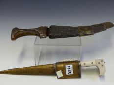 AN ARABIAN DAGGER IN A WHITE METAL MOUNTED SHEATH AND WITH A HORN HANDLE TOGETHER WITH A TURKISH