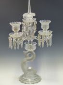 A BACCARAT THREE LIGHT LUSTRE CANDELABRUM, THE CLEAR GLASS WITH FROSTED DETAILS, THE DOLPHIN