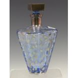 AN ART DECO PALE BLUE GLASS DECANTER, THE FACETTED SIDES TAPERING FROM BROAD SHOULDERS TO THE FOOT