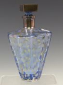 AN ART DECO PALE BLUE GLASS DECANTER, THE FACETTED SIDES TAPERING FROM BROAD SHOULDERS TO THE FOOT